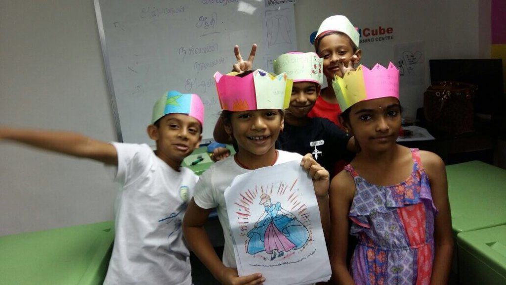 A Tamilcube instructor leading a preschool Tamil class in a Speech and Drama session.