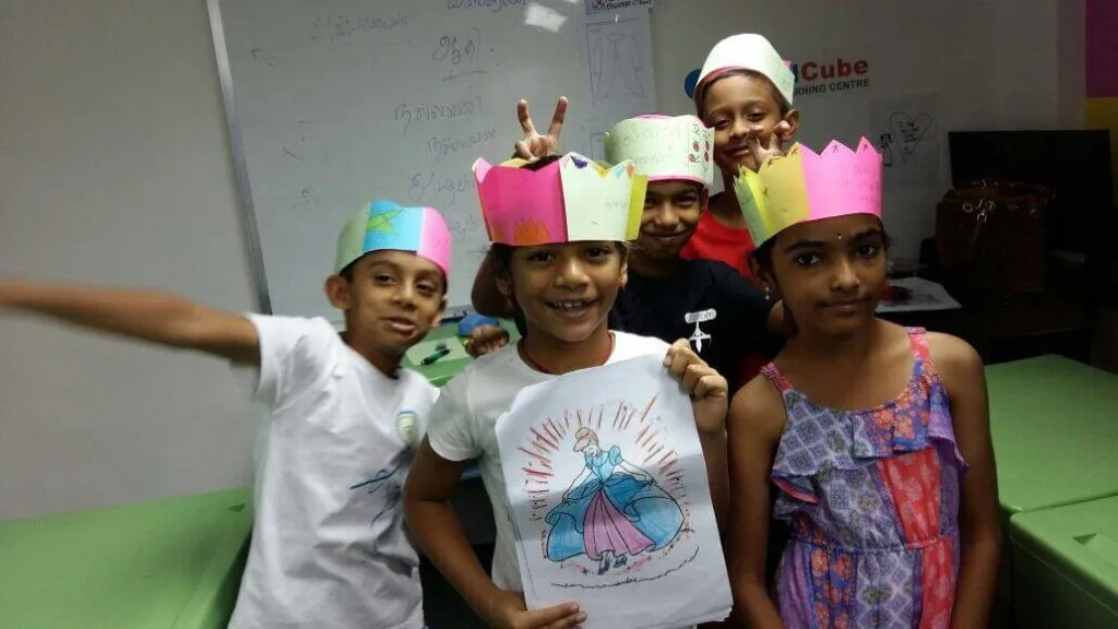 A Tamilcube instructor leading a preschool Tamil class in a Speech and Drama session.